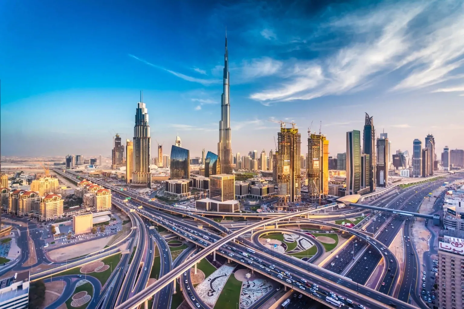 Dubai city skyline with modern buildings and skyscrapers at sunset